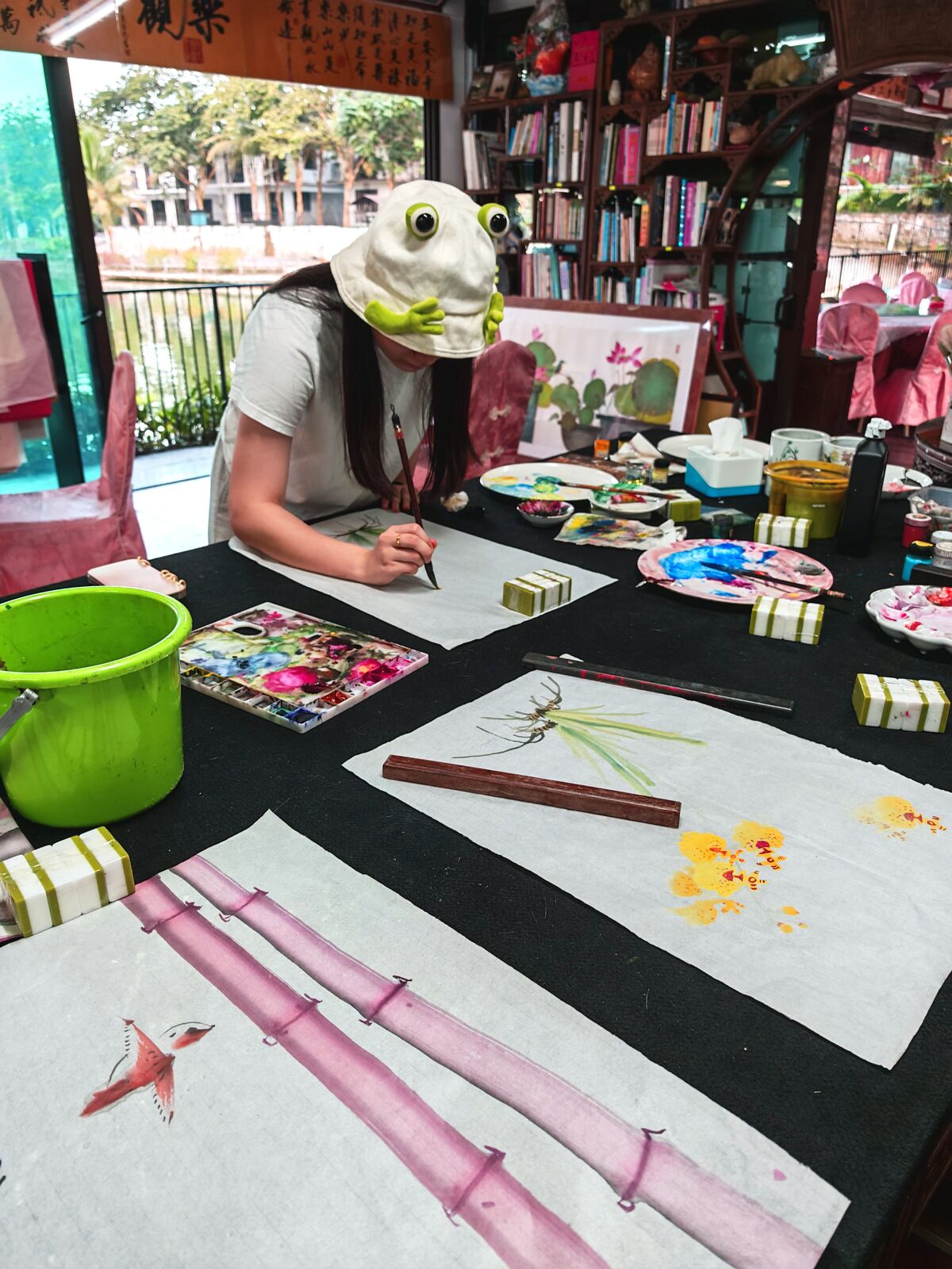 Guest painting traditional Chinese ink orchid during live demo session