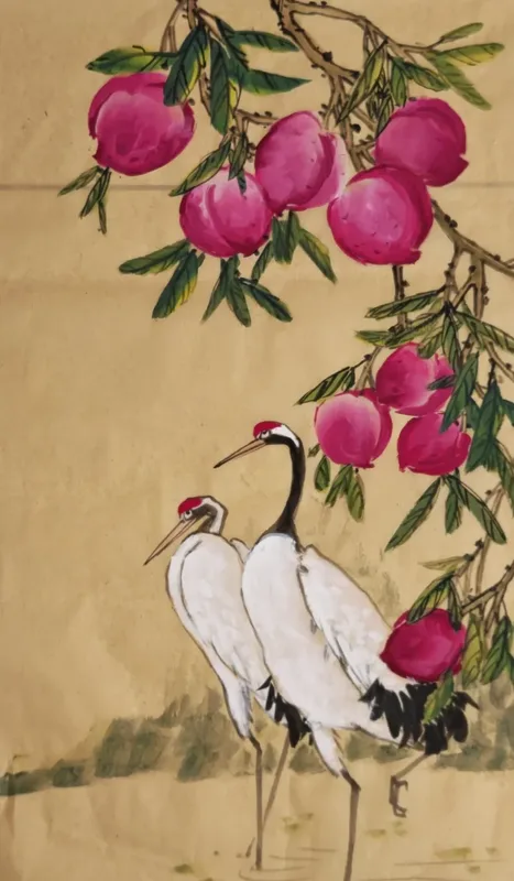 Ink painting: three cranes under a peach tree on gold paper